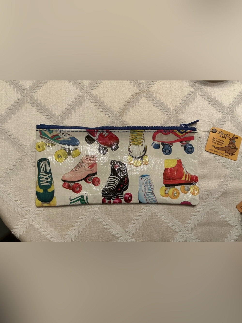 Blue Q Roller Skate Print Travel Pouch - Multicolor with Blue Zipper